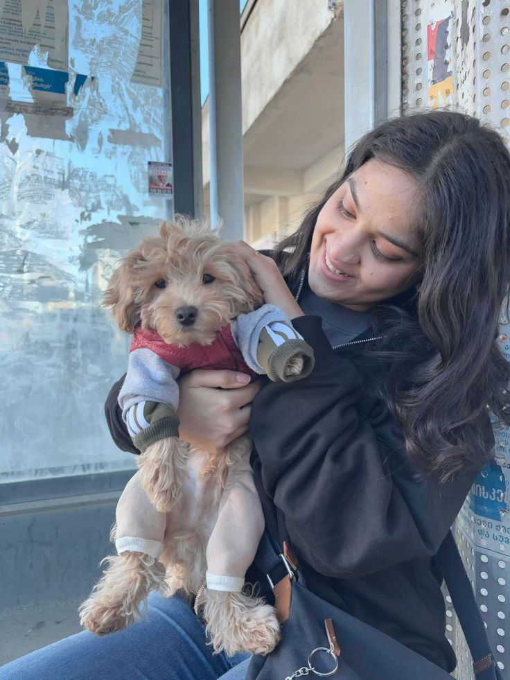 Emma Collins with their pet and product